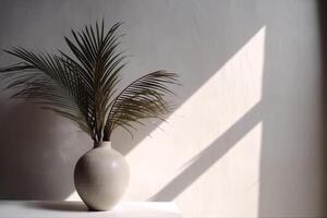 indoor view with pot and palm leaves photo