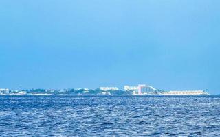 Isla Mujeres panorama view from speed boat in Cancun Mexico. photo