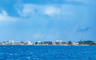 Isla Mujeres panorama view from speed boat in Cancun Mexico. photo