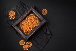 Beautiful Christmas decoration consisting of an old wooden box with dried citrus fruits photo