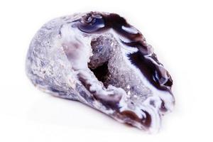 Macro mineral stone agate bud on white background photo