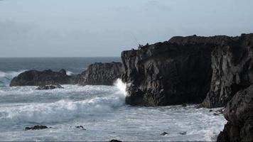 fisherman on cliff top in lanzarote video