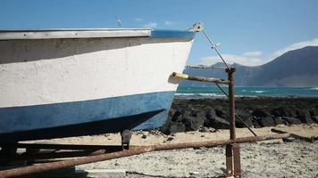 fishing boat andf Famara beach, Lanzarote. video