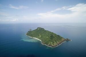 Aerial view of a small island in the middle of the ocean. photo