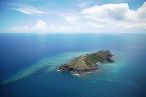 Aerial view of a small island in the middle of the ocean. photo