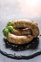 Raw homemade sausages photo