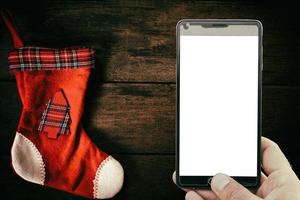 Christmas sock and blank screen photo