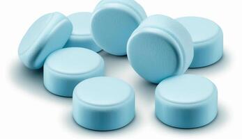 Pile of light blue pills - isolated, white background, photo