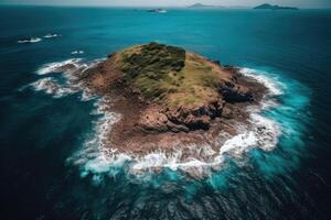 A tropical island in the middle of the ocean. Top view. Green palm trees and beach on the island. photo