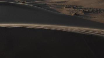 Sand Blowing In The Wind Over Desert Sand Dune Peak video