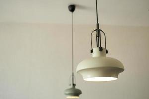 gray ceiling lamp hanging in a room , photo