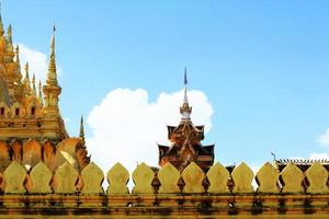 Beautiful great golden Pagoda at Wat Pha That Luang Temple at Vientiane province, Laos photo