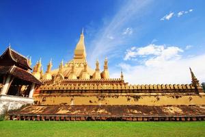 Beautiful great golden Pagoda at Wat Pha That Luang Temple at Vientiane province, Laos photo