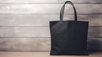 , Realistic black tote canvas fabric bag set-up in at interior or outdoor, shopper mock up blank. photo