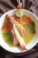 Yellow fish soup photo
