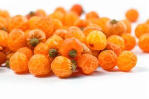 Fresh dessert cloudberry, isolate on white background. Macro studio shot. . photo