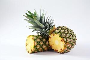 Isolated ripe fresh pineapple with leaf on white background. Vitamin-rich fruit. . photo