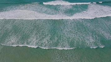 Foamy Waves Slowly Rolling Over The Sea Coast In Razo Beach, A Coruna, Spain. Aerial Shot video