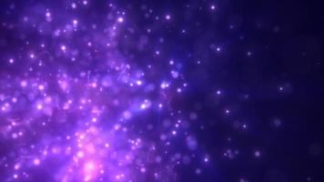 Abstract purple energy particles and dots glowing flying sparks festive with bokeh effect and blur background, video 4k, 60 fps