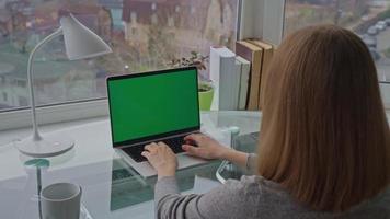 businesswoman using computer at home video