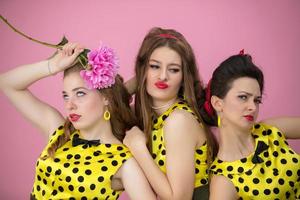 Funny retro girls. A group of women grimaces. photo