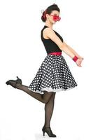 Retro girl in polka dot skirt photo