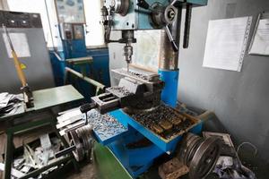 An old-style lathe in the workshop. photo