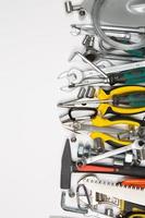 Set of tools for repair in a case on a white background. Assorted work or construction tools. Wrenches, Pliers, screwdriver. Top view photo