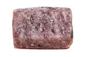 Macro mineral stone Ruby in the breed a white background photo