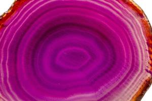 Macro mineral stone Purple Agate breed a white background photo