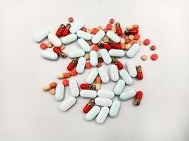 Assorted pharmaceutical medicine pills, tablets and capsules photo