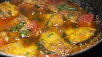 Close up of homemade indian curry fish video