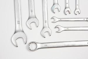 Set of tools for repair in a case on a white background. Assorted work or construction tools. Wrenches, Pliers, screwdriver. Top view photo