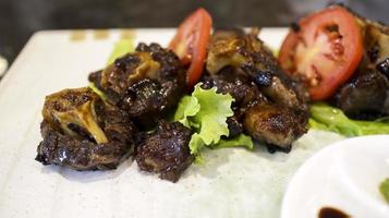 Main course Grilled oxtail usually served with soup and rice, authentic Asian food. photo