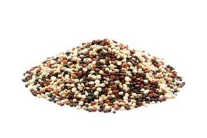 heap of quinoa seeds isolated on white background. a pile of quinoa seeds isolated on white background. quinoa seeds photo