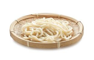 close up udon noodle in wood bowl isolated on white background with clipping path photo