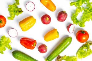 Flat lay composition with fresh ripe vegetables on white background photo