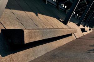 brownstone bench at park background photo