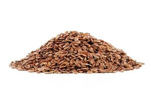 Flaxseed linseed isolated on white background. Flaxseed linseed heap isolated on white background. Pile of Flaxseed linseed isolated on white background with clipping path. flax seed photo