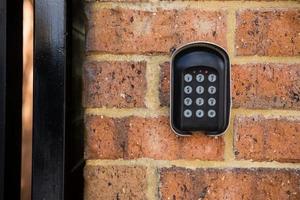 A regular security systems keypad with buttons photo