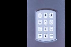 A regular security systems keypad with buttons photo