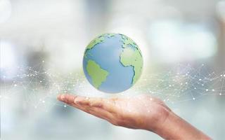 concept of earth day cute global or planet earth with man hand on blur white bokeh background. abstract plexus 3D illustration photo