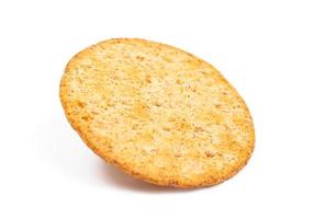 Baked round cracker chips isolated on white background. Wheat cracker chips isolated on white background. Whole wheat cracker isolated on white background with clipping path photo