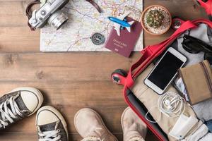 Travel accessories costumes. Passports, luggage, camera, sunglasses, boot, sneaker photo