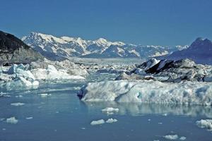 Ice, water, and Mountains on a clear day photo