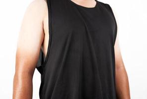 Asian man who wears black tank top shirt with two-tone skin arm isolated on white background photo