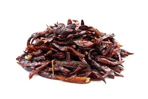 pile of dry red chilli chili pepper isolated on white food spices background. chilli, chili, pepper photo