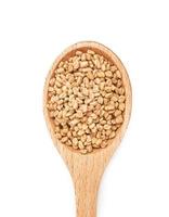 top view or flat lay fenugreek seed in wooden spoon isolated on white background. fenugreek isolated photo