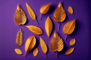 Pattern of dry orange metallic leaves on pink violet background. photo