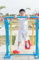 obese fat boy exercise at public Health Park photo